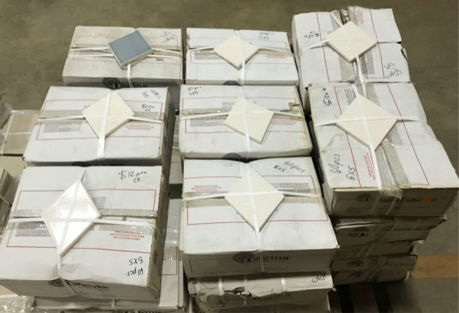 Photo of a pallet of thick diamond-shaped tiles